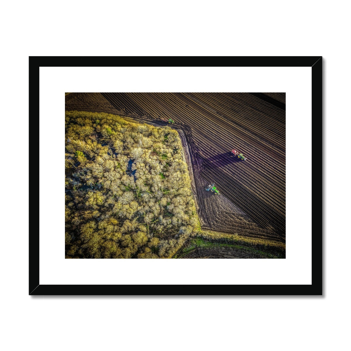 ploughing the fields framed print